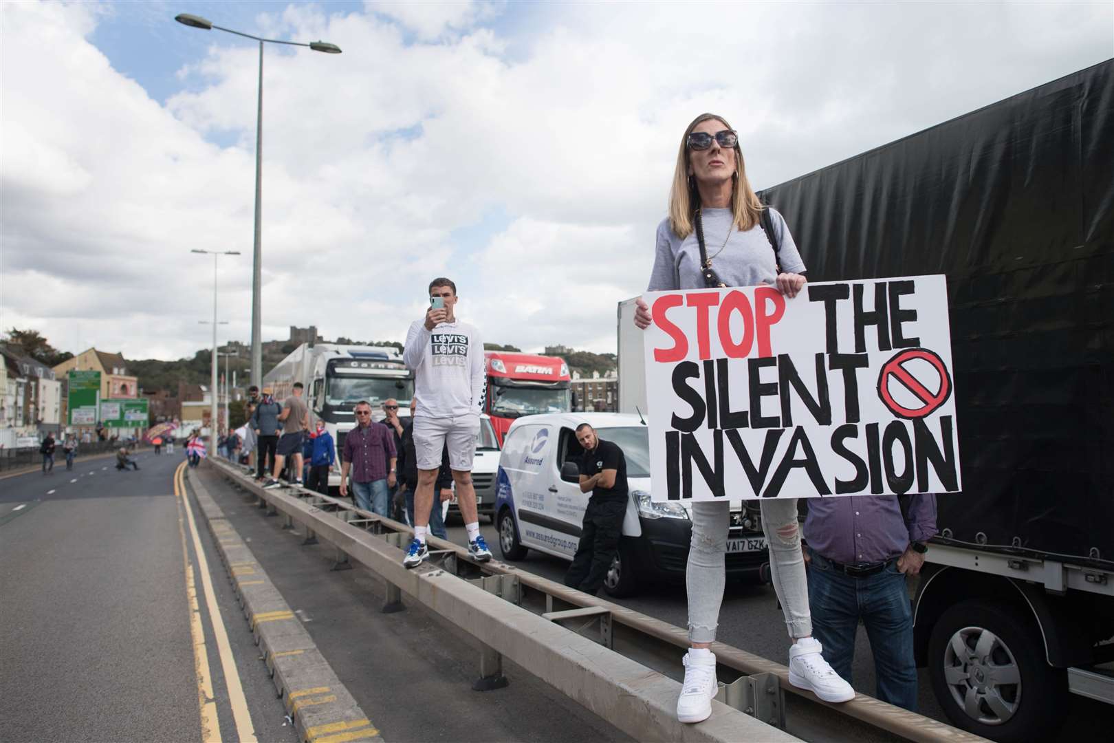 Anti-migrant protesters demonstrate in Dover (Stefan Rousseau/PA)