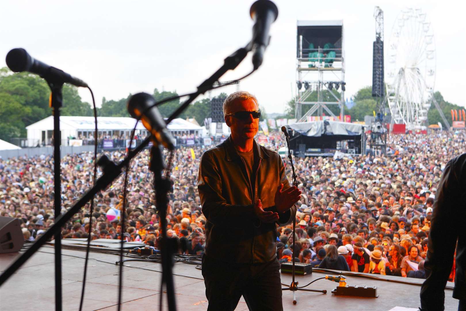 Isle of Wight Music Festival organiser and music promoter John Giddings on stage between acts at Seaclose Park in Newport (PA)