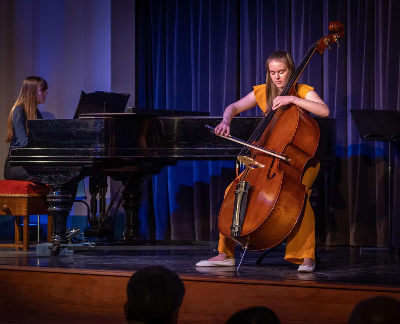 Annabel Beniston, accompanied on the piano by her sister Emma