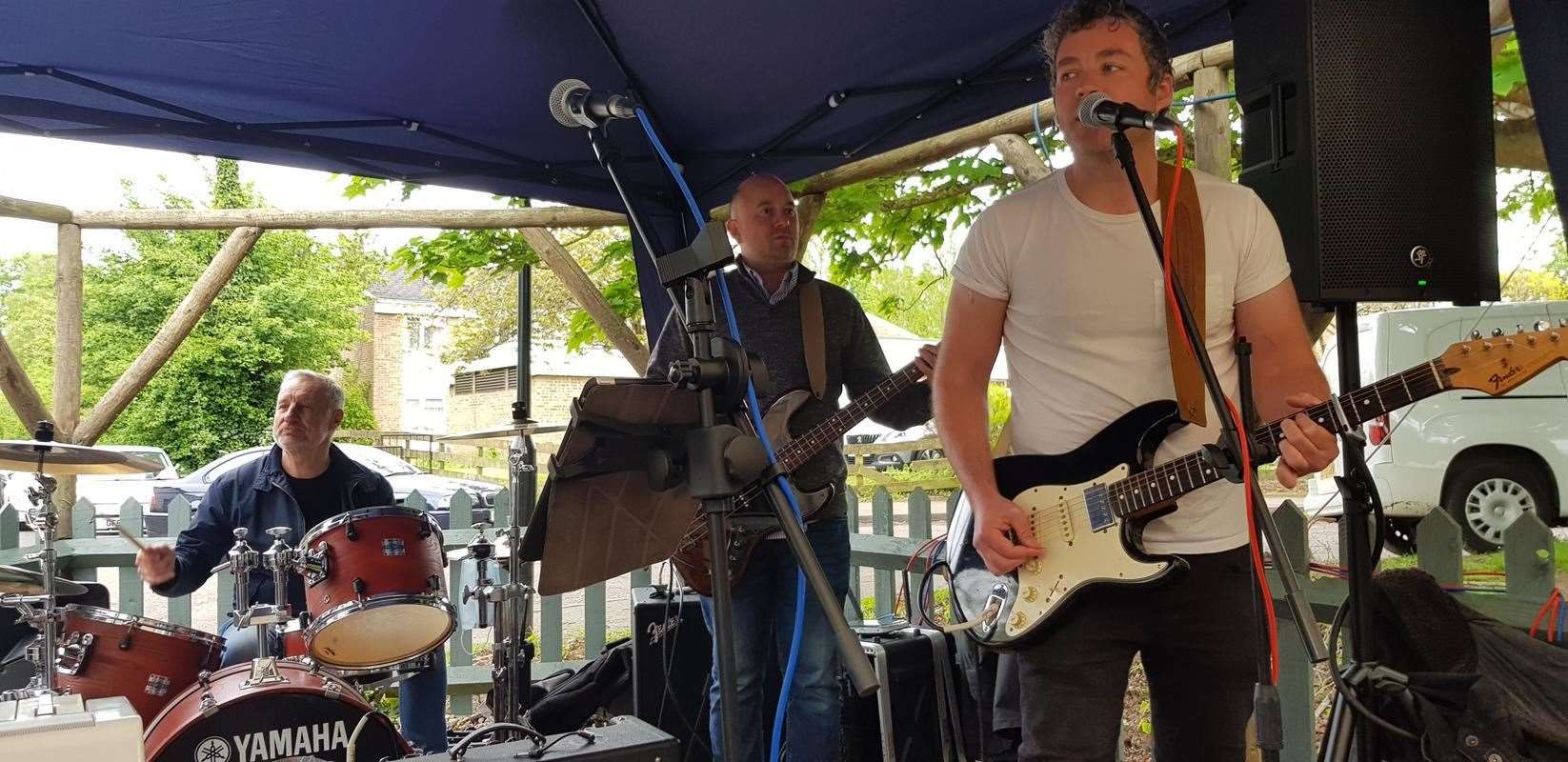 Chris Hunter, right, with Roger Gluck on drums and Alex Palmer on bass