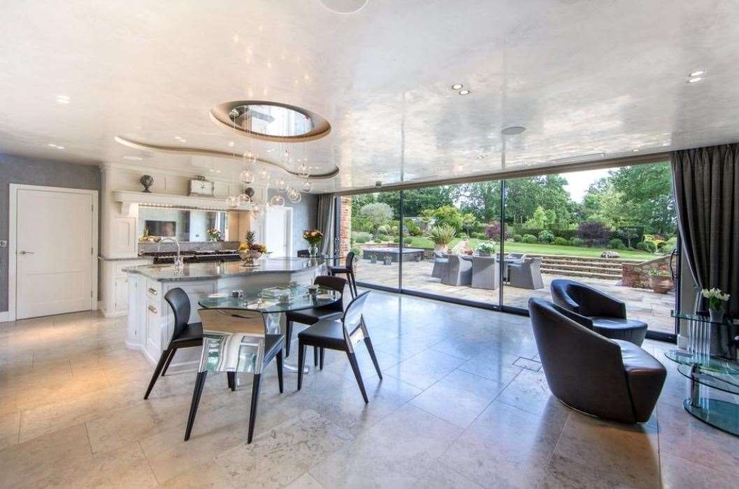 The bespoke kitchen, fitted with Gaggenau appliances. Picture: John D Wood