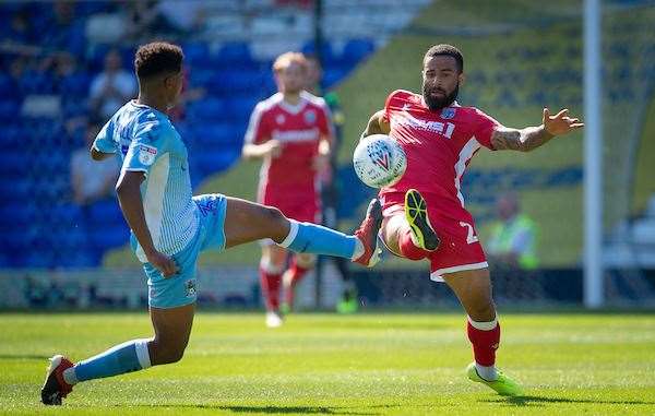 Sam McCallum up against the Gills earlier this season for Coventry City Picture: Ady Kerry