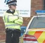 A policeman stands guard outside the sorting office today. Picture: MATT WALKER