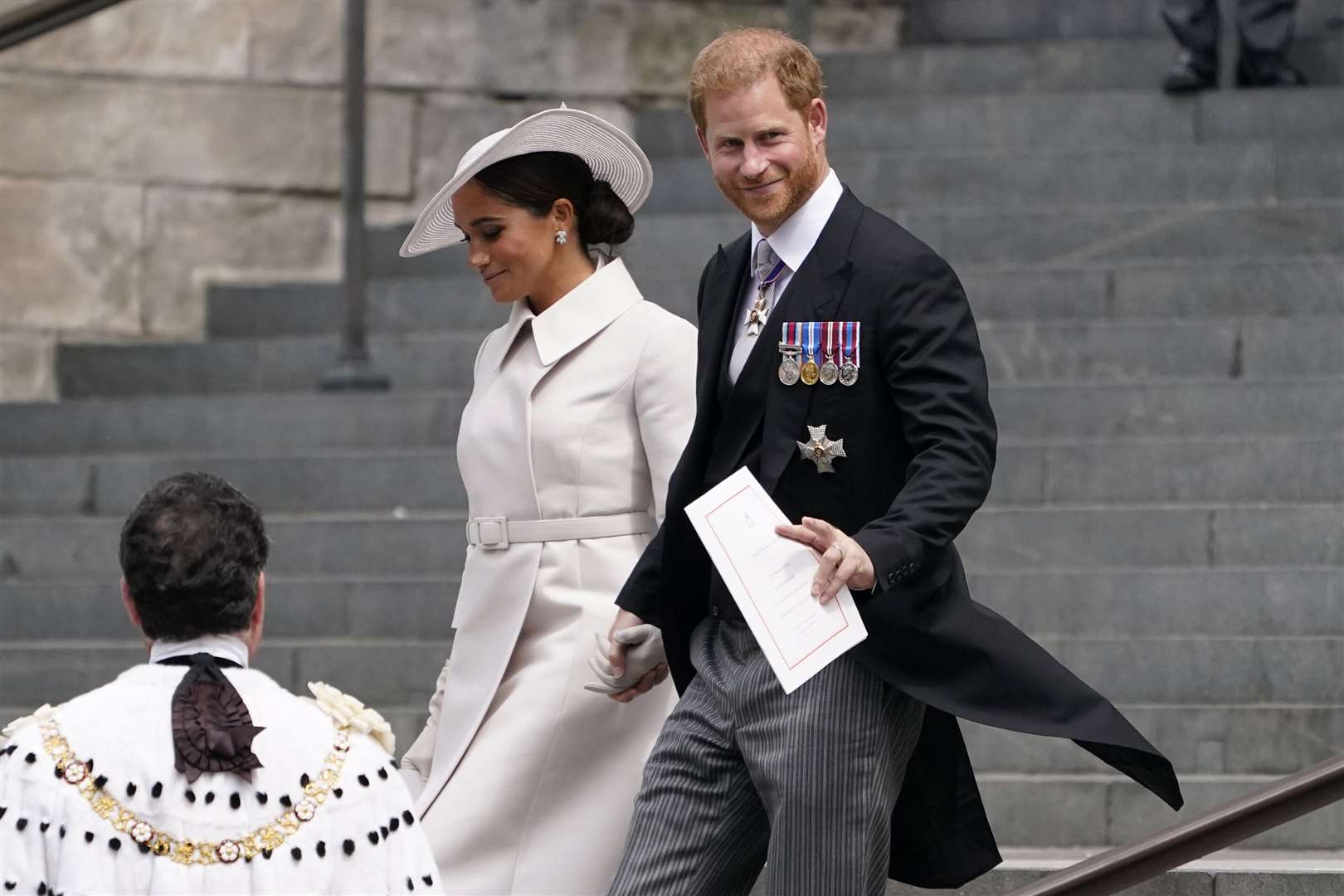 The Duke and Duchess of Sussex leaving for the National Service of Thanksgiving at St Paul’s Cathedral, London, on day two of the Platinum Jubilee celebrations for the Queen in 2022 (Matt Dunham/PA)