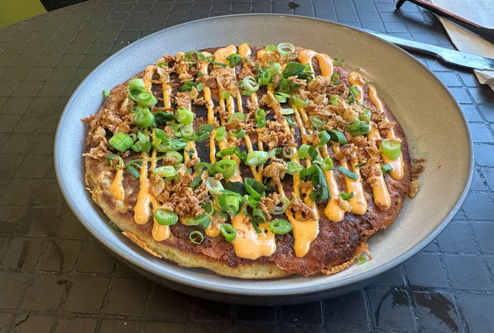 My acquaintance loved the okonomiyaki - a savoury pancake