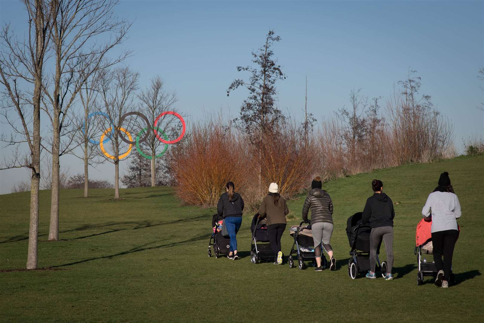 A group of mothers push their babies in prams (Stefan Rousseau/PA)