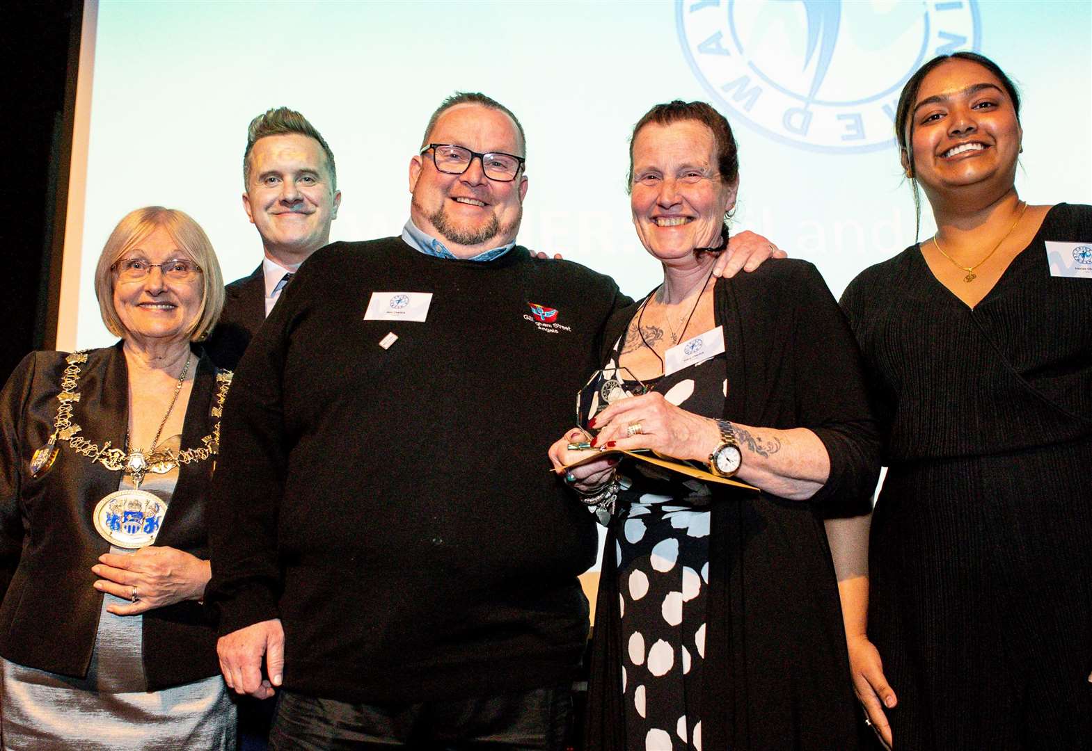 Neil and Tracy Charlick accepting a Pride of Medway award last year on behalf of Gillingham Street Angels. Picture: Matt Bristow