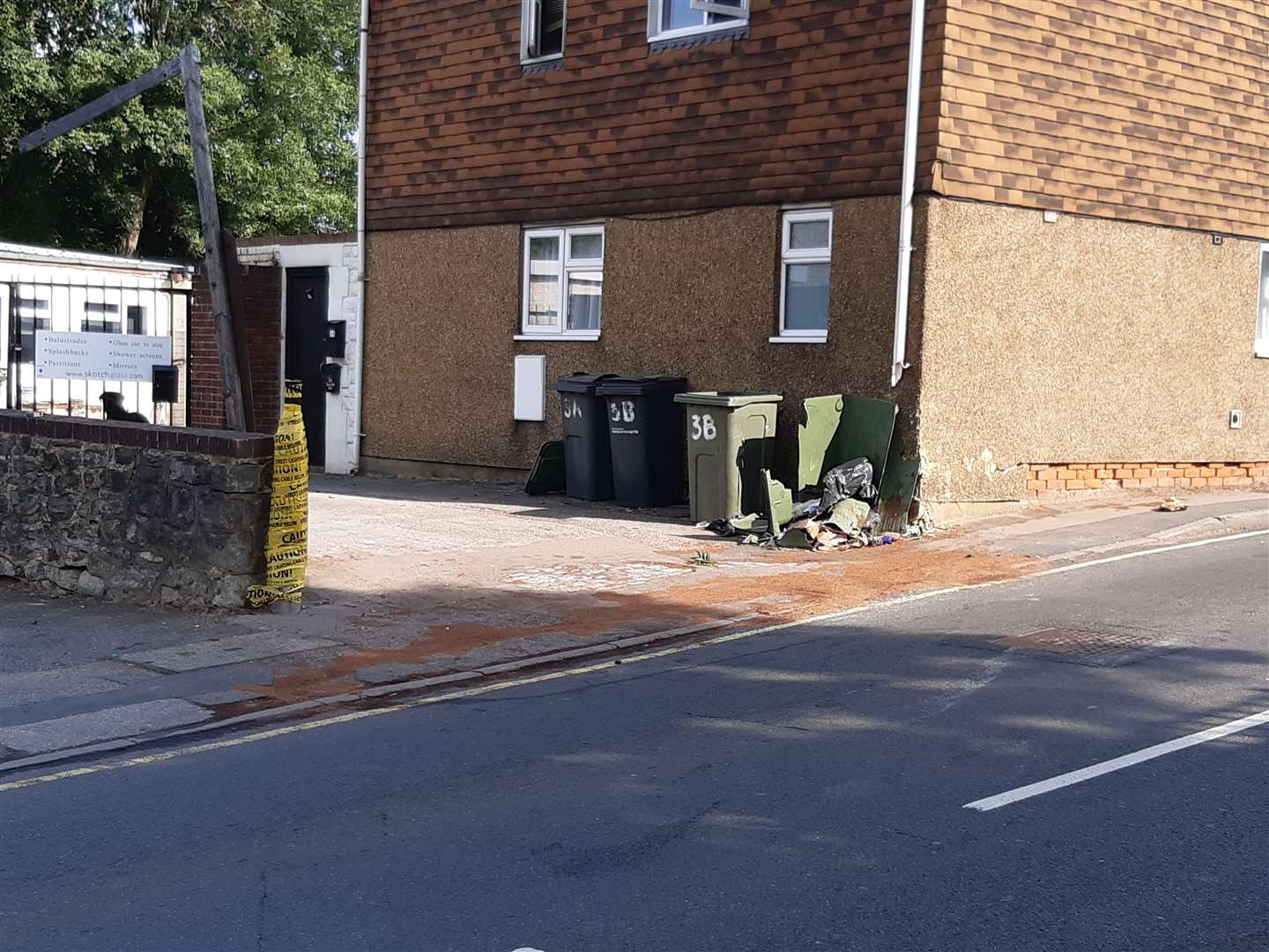 The vehicle first struck the lamp-post, covered in yellow tape, before hitting the corner of the building