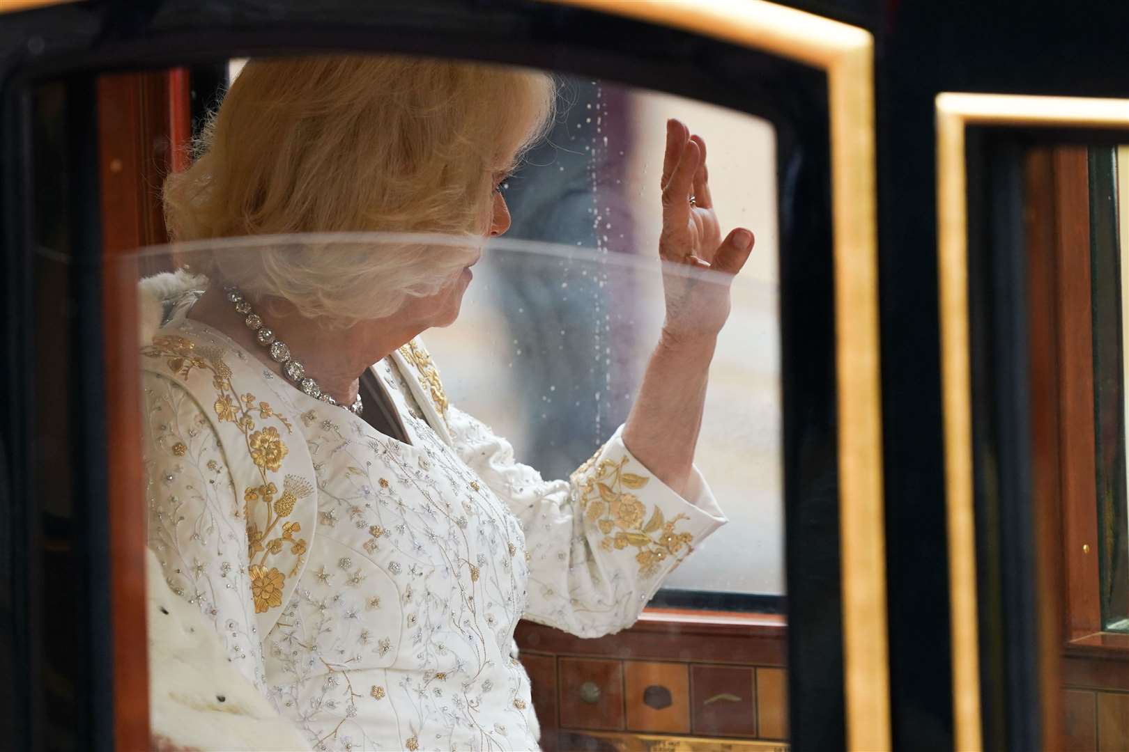 Queen Camilla carried in the Diamond Jubilee State Coach (James Manning/PA)