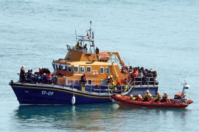 Migrants arriving in the UK. Photo Gareth Fuller/PA