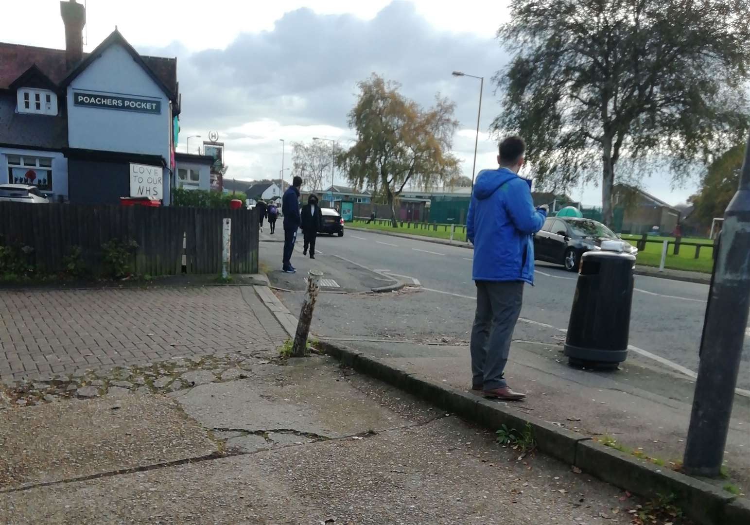 Teachers standing outside Dominion Stores