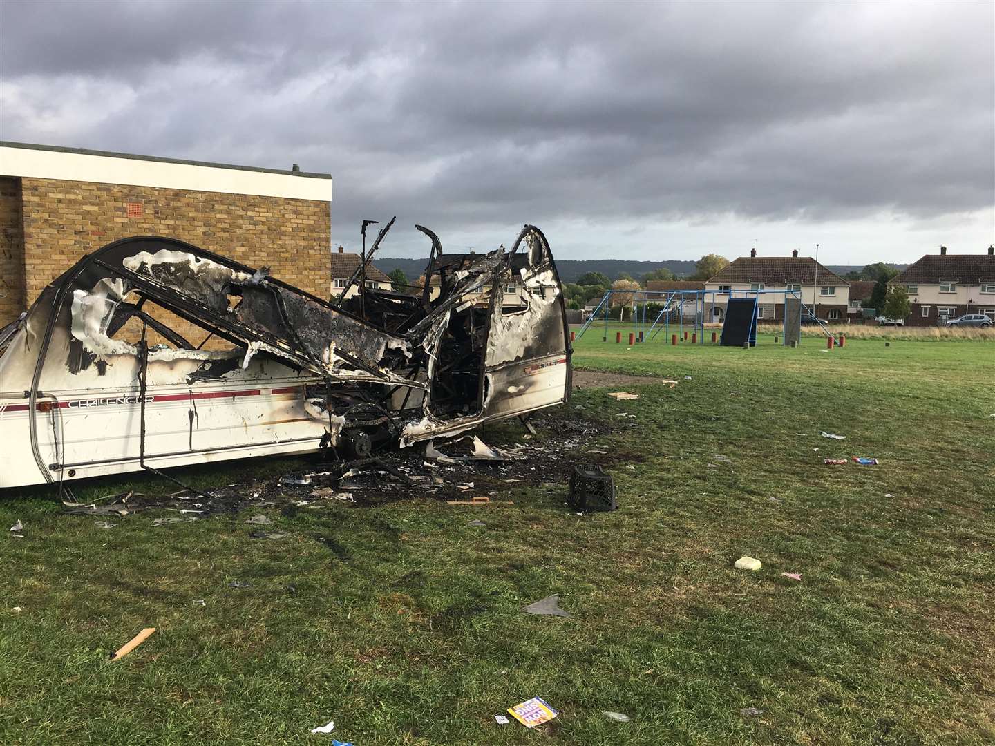 Travellers have left a burnt out caravan and human waste on Shepway Green