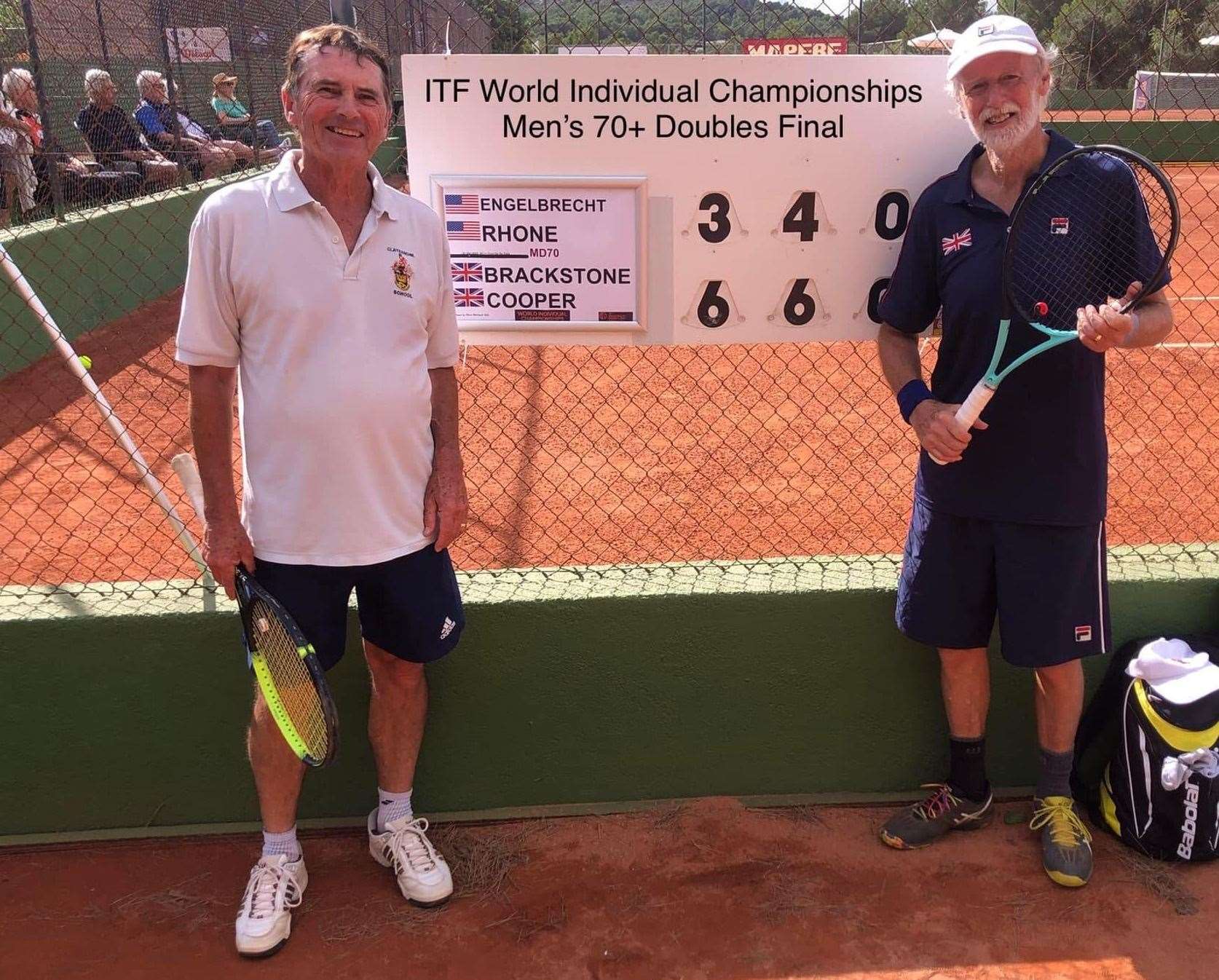 Jasper Cooper, right, celebrates with playing partner Boyd Brackstone after their doubles over-70s Final success at this year's World Tennis Championships in Mallorca