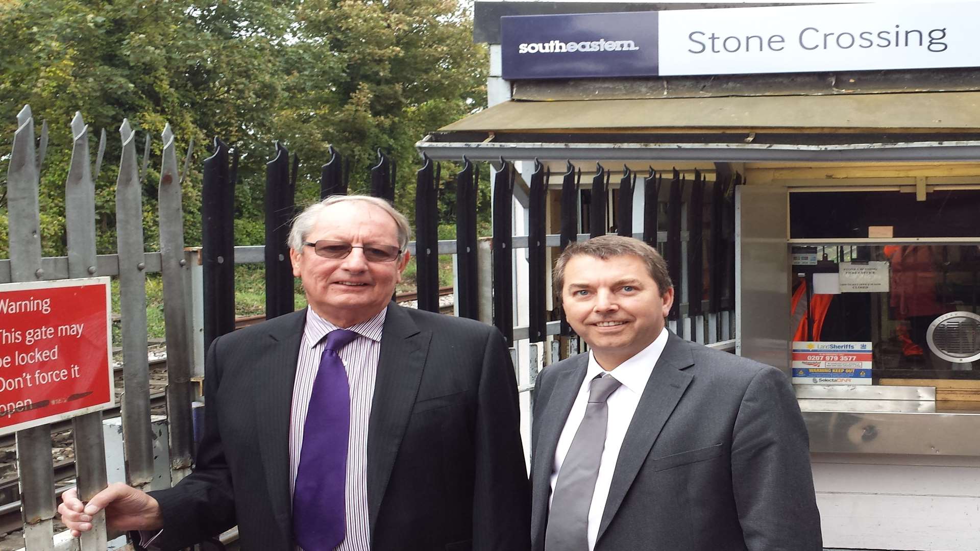 Gareth Johnson MP and Cllr John Burrell at Stone Crossing train station crossing