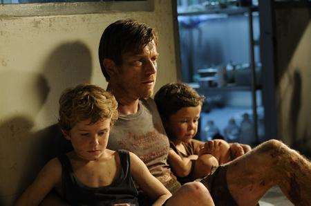 The Impossible (l-r) Samuel Joslin, Ewan McGregor and Oaklee Pendergast. Picture: PA Photo/E One