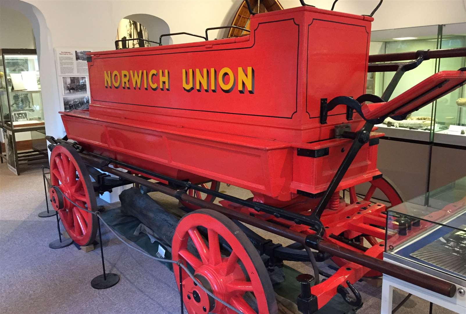 The restored fire pump in the Whitstable Community Museum and Gallery