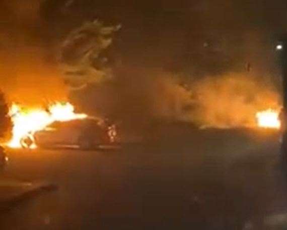 Cars on fire in Bishops Way. Pic: Sandie de Rougemont