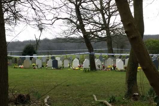 The graveyard was cordoned off by police