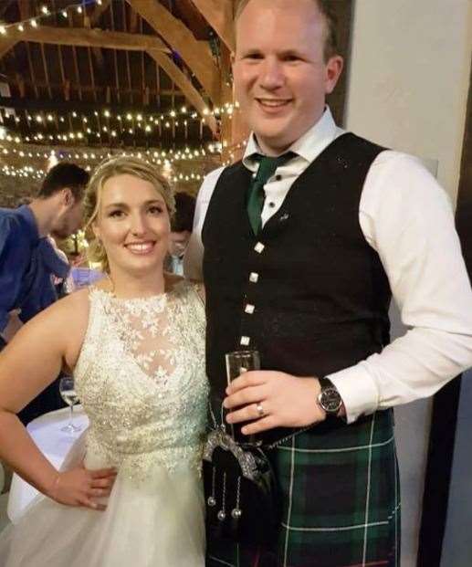 Emma and David Wiseman at their wedding reception at Cooling Castle Barn