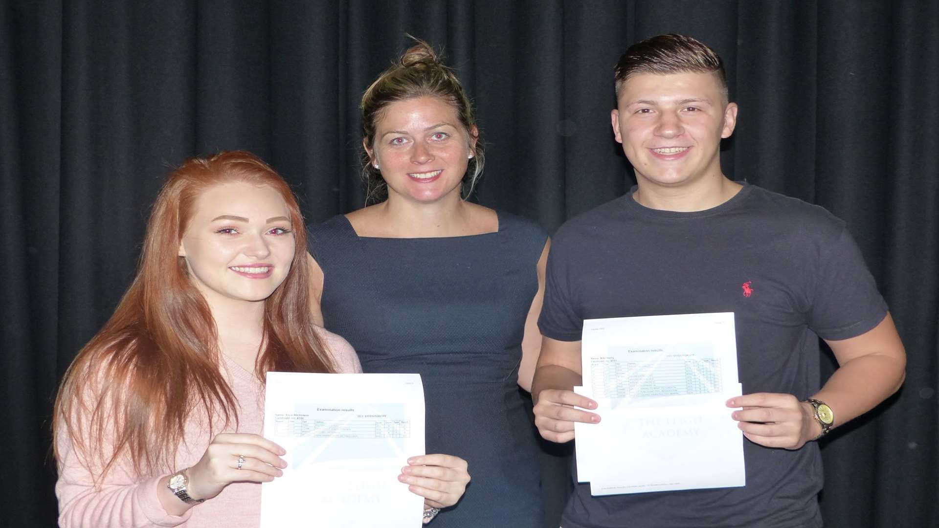 Alice Nicholson, with 2distinction*, 2B and 1C, and head boy Max Horry, who got 2distinction*, 1A and 1C, celebrate with academy principal Julia Collins. Picture: Leigh Academy