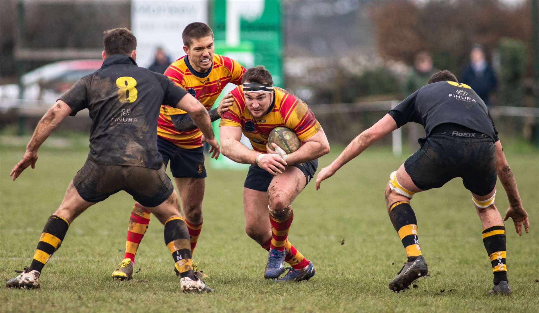 Medway's Dan Huntley, supported by Ben Dance, takes on Tring. Picture: Jake Miles Sports Photography