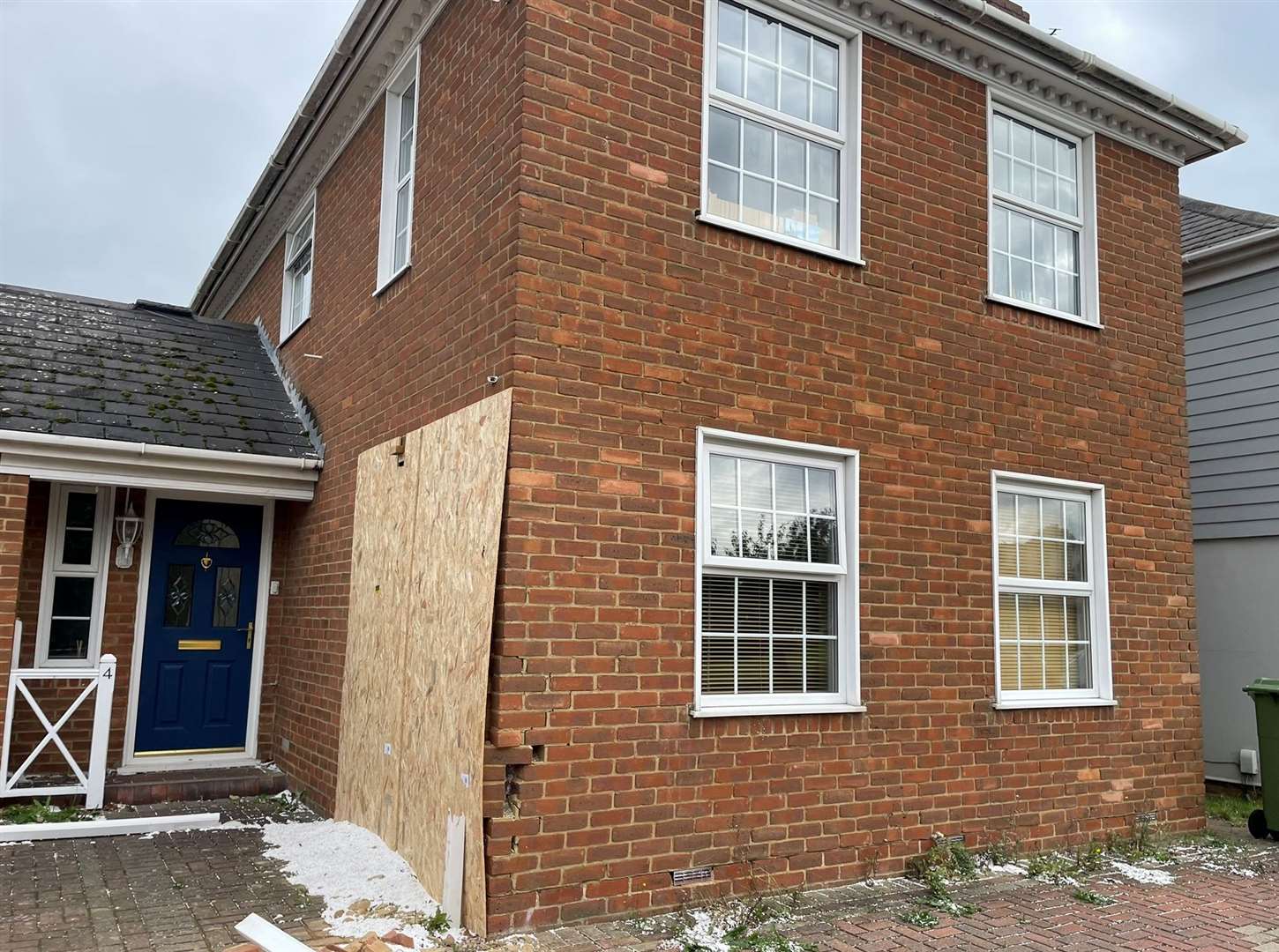 The home has been boarded up following the crash. Picture: Joe Crossley