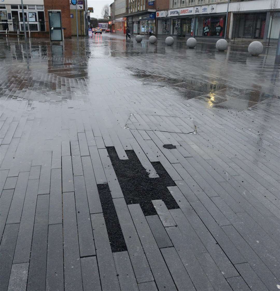 An area of the paving had been filled in following underground service works carried out by an external company as part of the regeneration project. Picture: Chris Davey