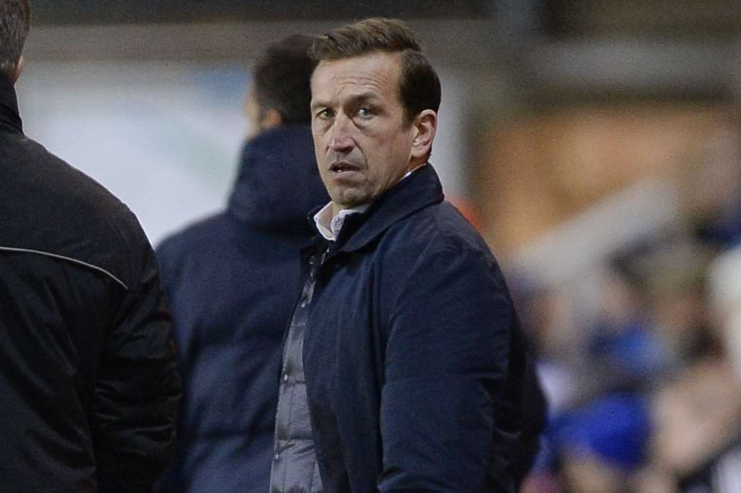 Gillingham manager Justin Edinburgh watches on at Peterborough Picture: Ady Kerry