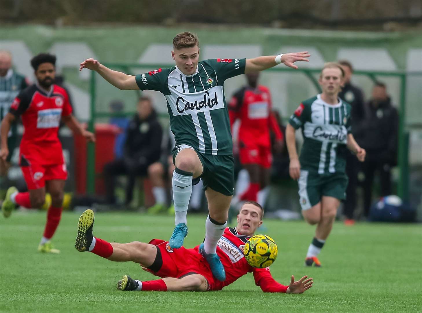 Ashford United midfielder Jack Saunders skips a challenge. Picture: Ian Scammell