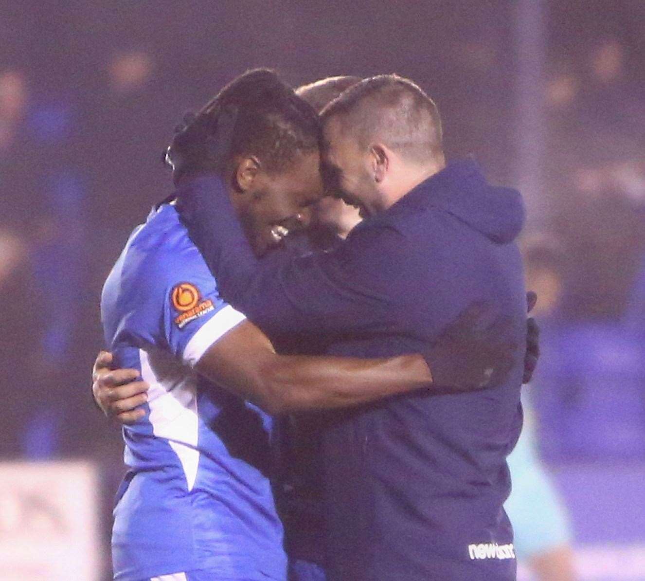 Steve McKimm embraces match-winner Ibrahim Olutade after Tonbridge's FA Trophy victory over Torquay Picture: Dave Couldridge