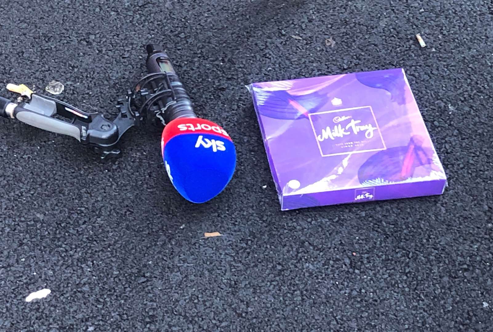 The box of Cadbury Milk Tray on the pavement outside court (Matthew Cooper/PA)