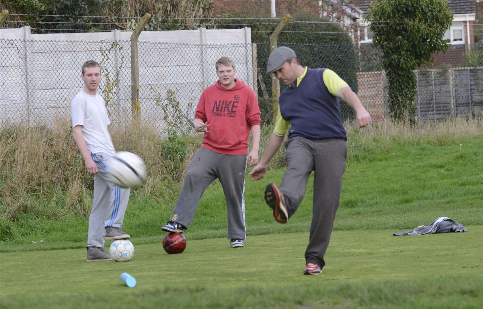 John Denham, Barry Trip and Tim Porter 'teeing' off on Folkestone Sports Centre’s footgolf course