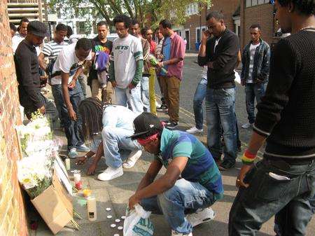 Friends gather at spot where Tomas was killed