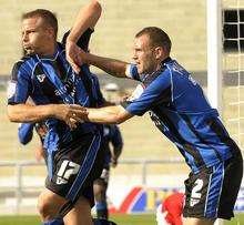 Barry Fuller congratulates Danny Spiller on his goal against Morecambe