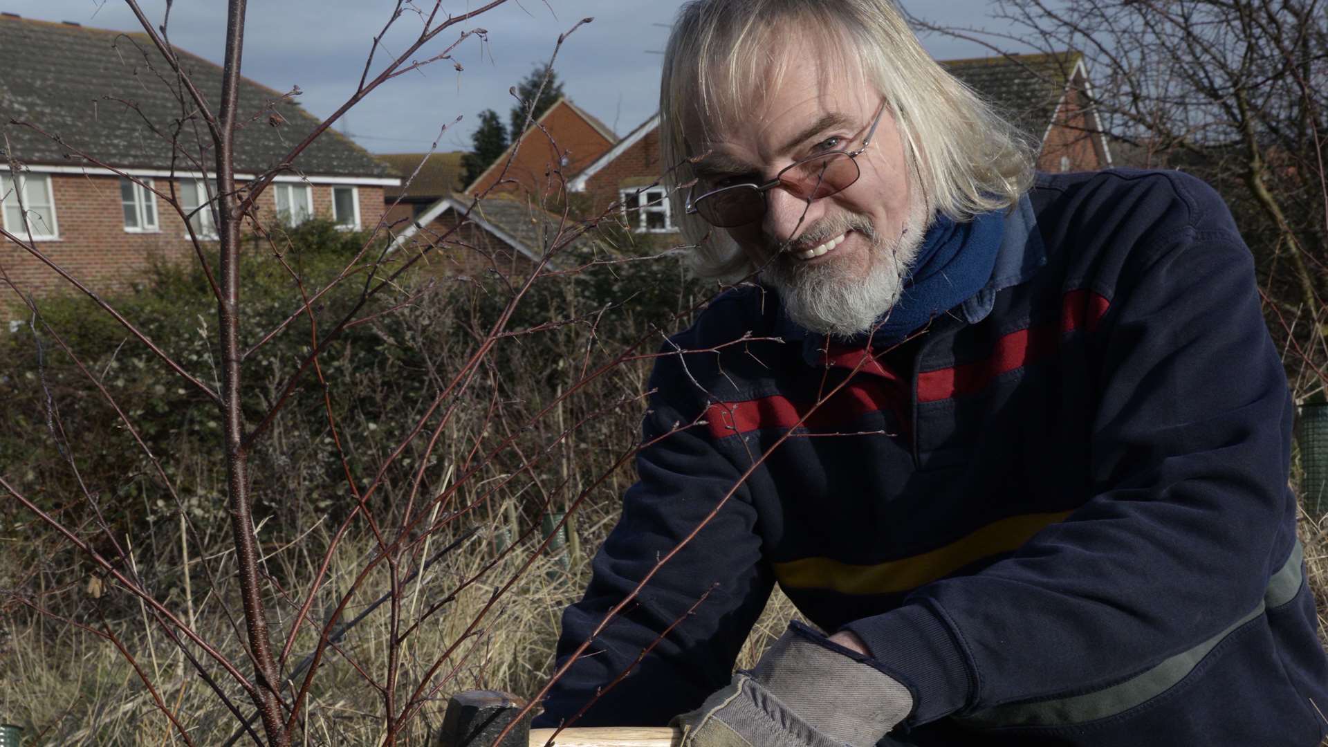 Keen gardener Dave Eldred came along with tools to plant