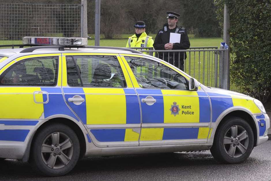 Police officers at the scene of the grim discovery in Kemsley. Picture: Andy Payton