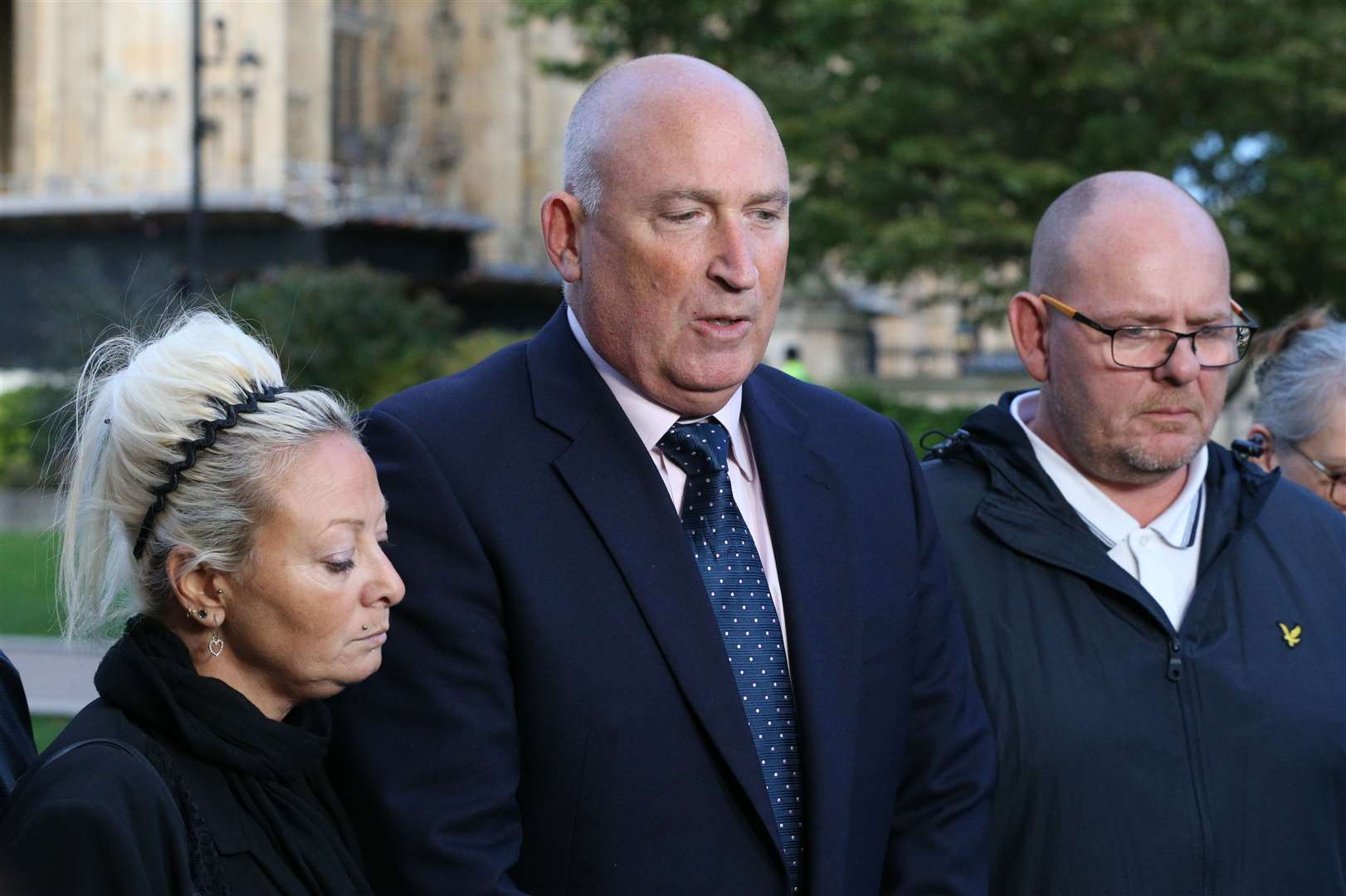 Spokesman Radd Seiger for the family of Harry Dunn, flanked by mother Charlotte Charles and father Tim Dunn (Jonathan Brady/PA)