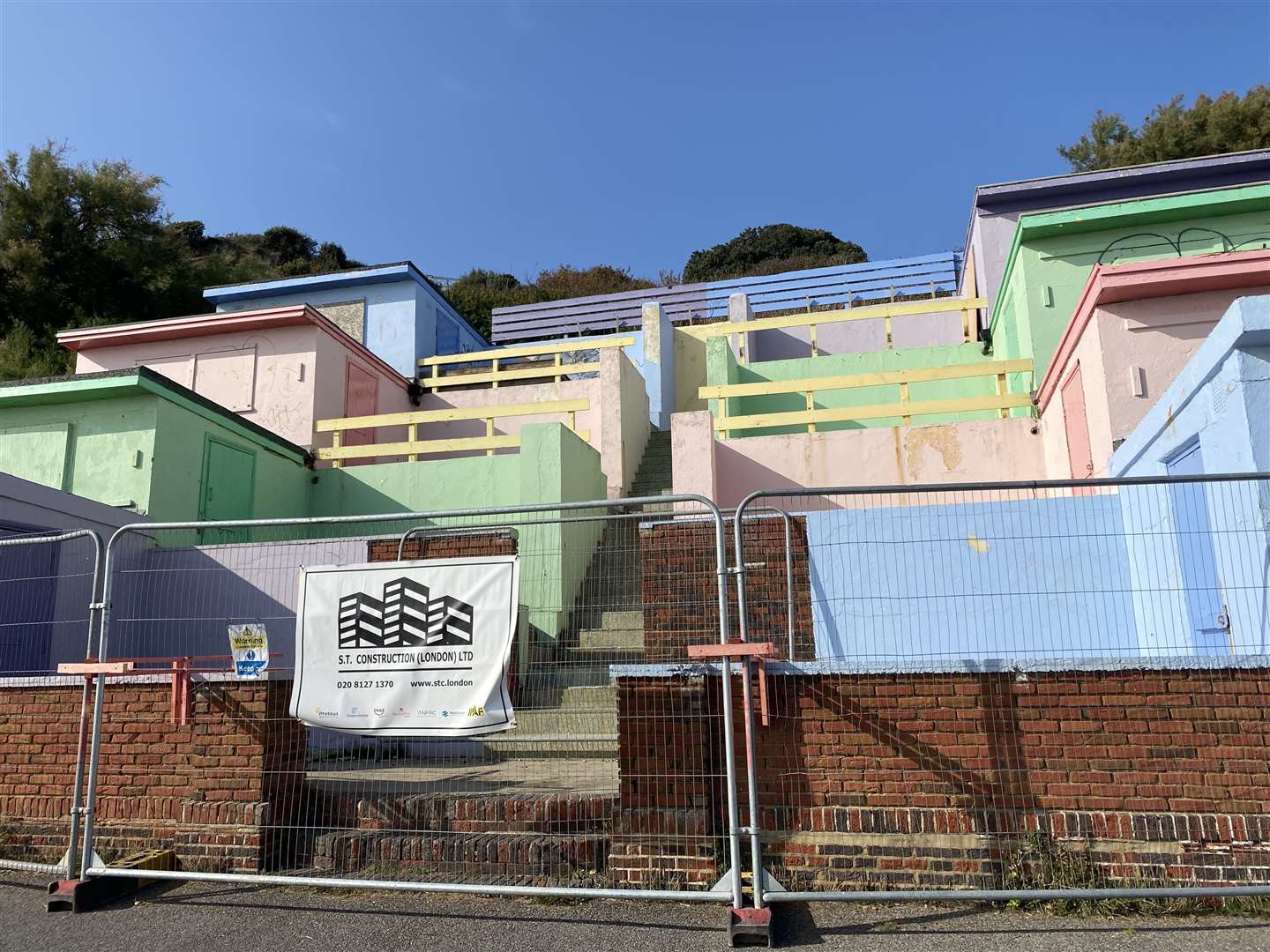 The existing, pastel-coloured, tiered chalets are among those to be kept and renovated