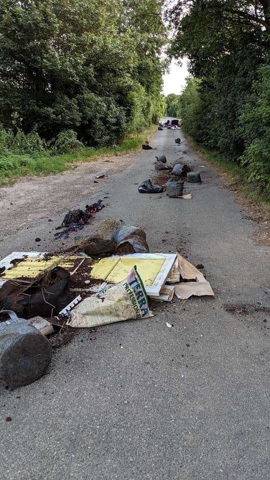 Residents have slammed the fly-tipping in Downs Road, branding it 'disrespectful'. A black leath sofa and multiple rubbish bags were dumped in Downs Road, near Gravesend Picture: Richard Rushen (13716215)