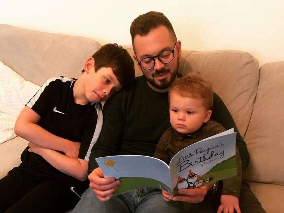 Dad Tim Johnston with Louis and Otis. (18384026)