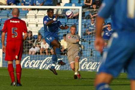 Two-goal hero Delroy Facey challenges keeper Dean Gerken. Picture: PETER STILL