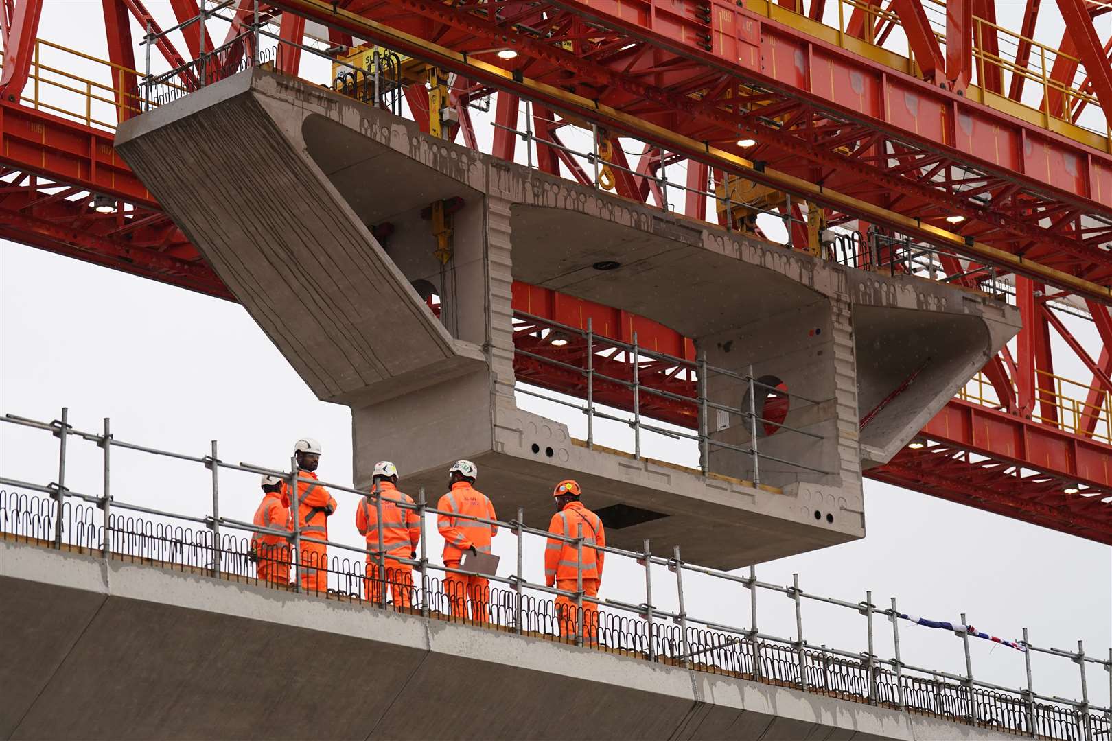 The final deck segment is lowered into place (Joe Giddens/PA)