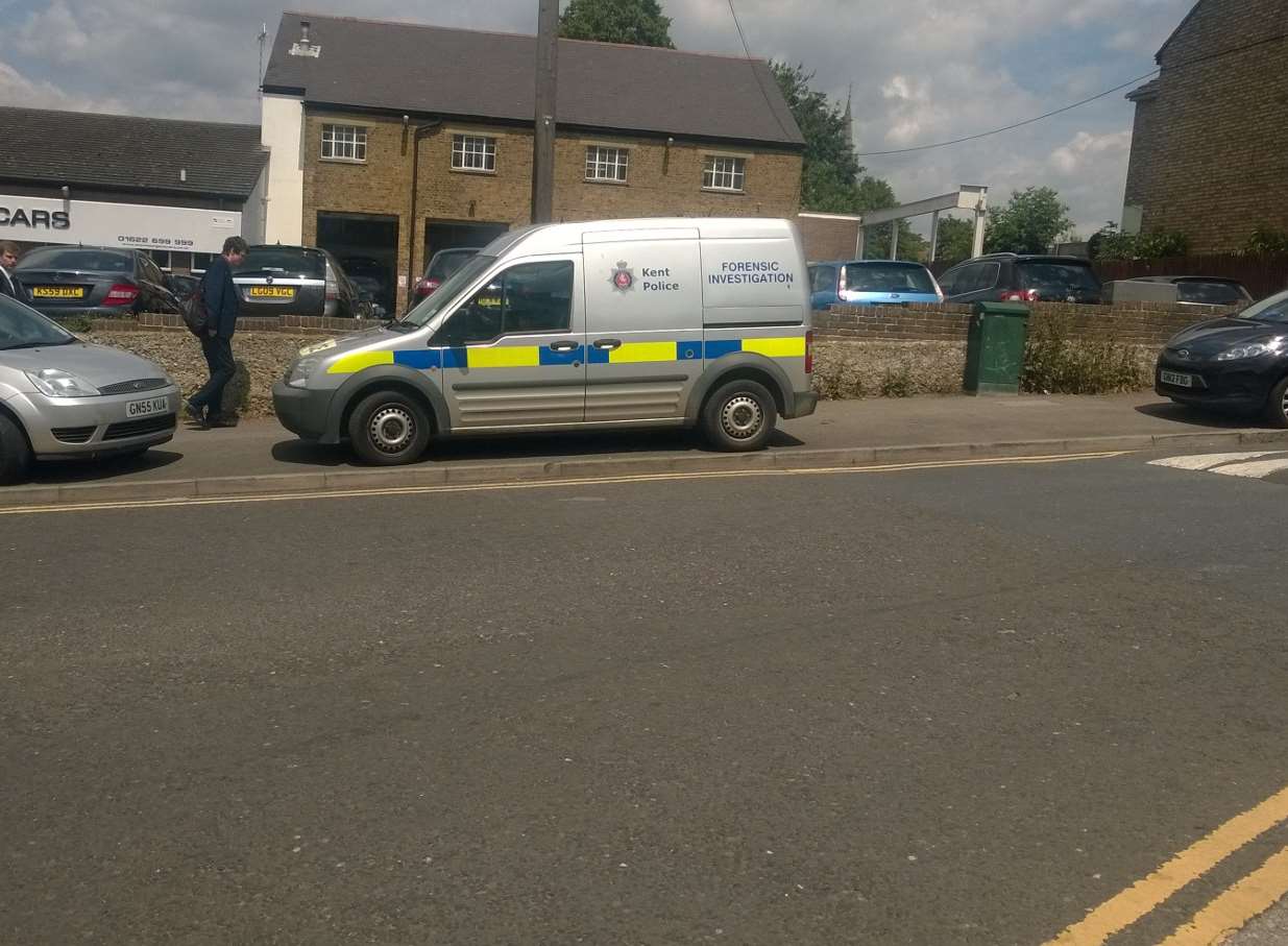 A forensics van in the street