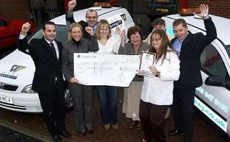 Last year's winners, Strood-based Ward Security, celebrate their award. Picture: MATTHEW READING