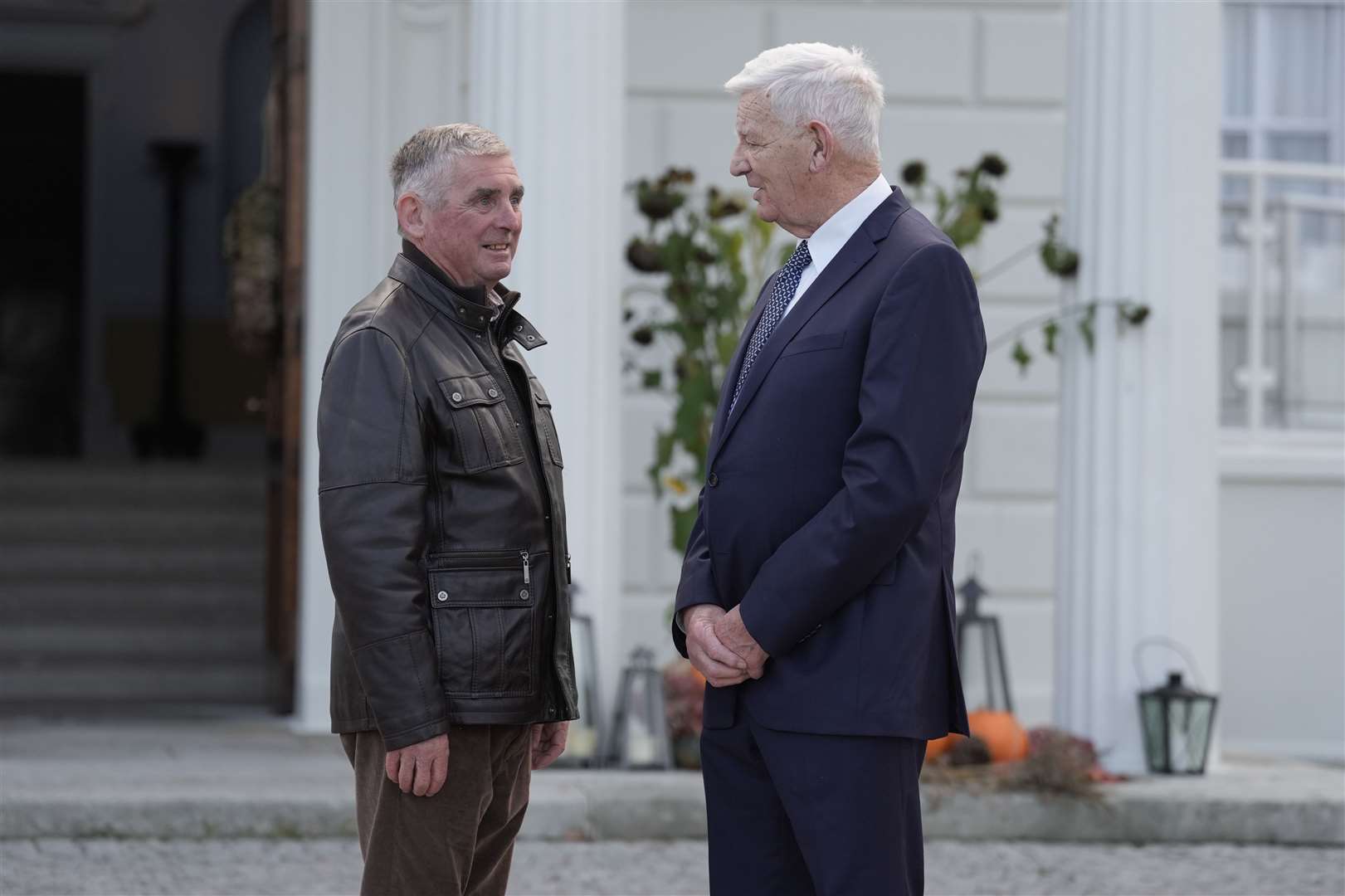 Sylvester Poff’s great-grandsons Mike Sugrue (left) and his cousin Tomo Burke speak together ahead of the ceremony (Brian Lawless/PA)