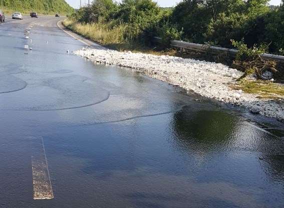 The sewage poured down the hill and onto the M2