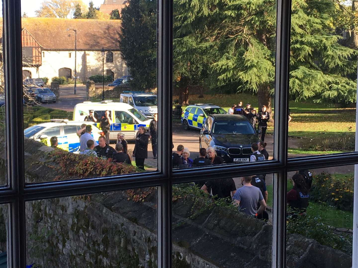 Police swarm the Archbishops Palace in Maidstone