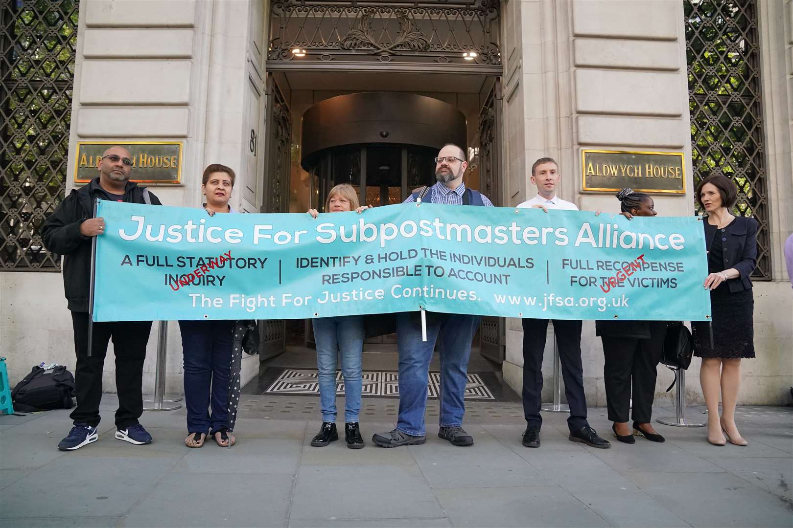 Members of the Justice For Subpostmaster Alliance protest outside Aldwych House in central London (Jonathan Brady/PA)