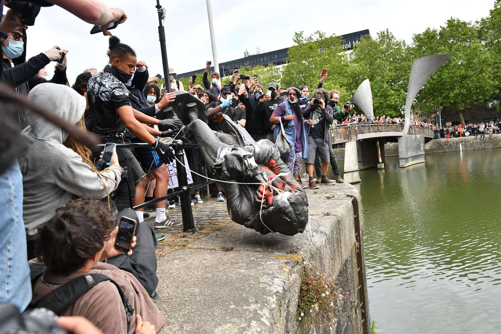 Protesters throw statue of Edward Colston into Bristol Harbour (Ben Birchall/PA)