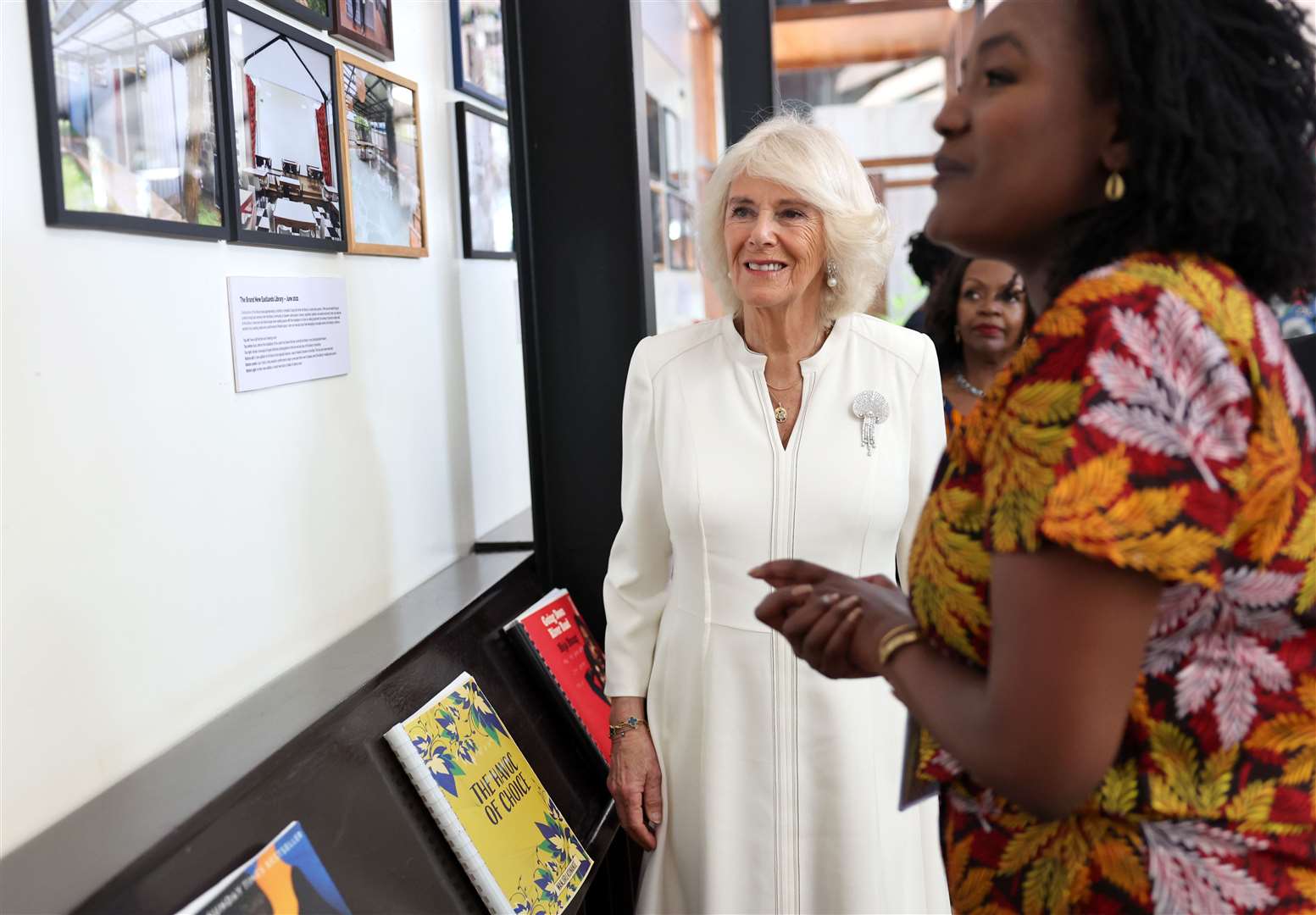 Camilla views the Camp Toyoyo exhibition wall at Eastlands Library (Chris Jackson/PA)